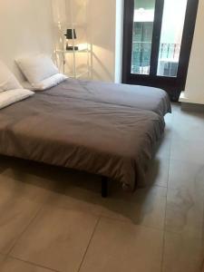 Posteľ alebo postele v izbe v ubytovaní LovelyLoft Castaños