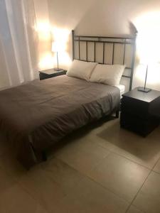 Posteľ alebo postele v izbe v ubytovaní LovelyLoft Castaños