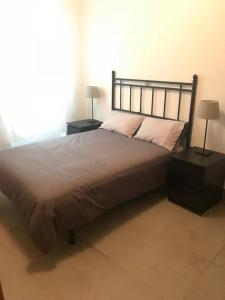 Posteľ alebo postele v izbe v ubytovaní LovelyLoft Castaños