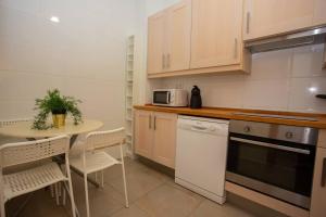 Kuchyňa alebo kuchynka v ubytovaní LovelyLoft Castaños