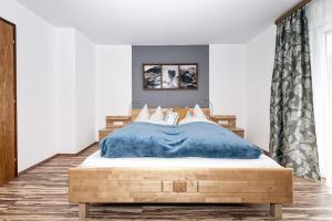 Postel nebo postele na pokoji v ubytování Genuss.Haus.Fankhauser