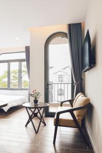 TV a/nebo společenská místnost v ubytování Vĩnh Tuấn Hotel