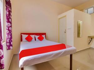 Giường trong phòng chung tại Hotel O G7 Residency