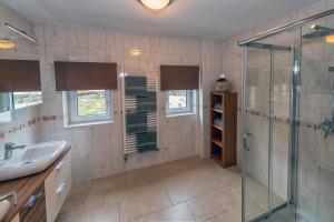 Koupelna v ubytování Genuss.Haus.Fankhauser + 19 fotografií