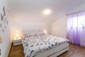 Ein Bett oder Betten in einem Zimmer der Unterkunft Apartment in Malinska - Insel Krk 38057