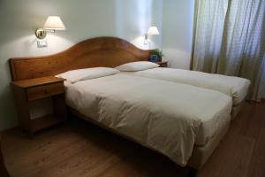 Postel nebo postele na pokoji v ubytování Hotel Residence Valverde