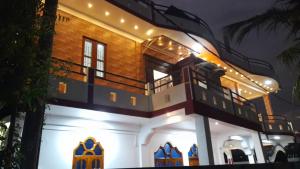 a model of a house with lights on it at Trinco Harbour Villa in Trincomalee