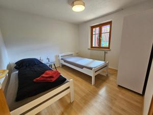 Postel nebo postele na pokoji v ubytování S12 Dornbirn, Vorarlberg Apartments