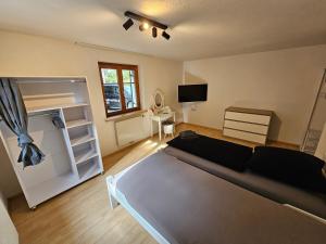 Postel nebo postele na pokoji v ubytování S12 Dornbirn, Vorarlberg Apartments