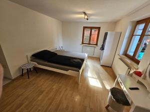 Postel nebo postele na pokoji v ubytování S12 Dornbirn, Vorarlberg Apartments