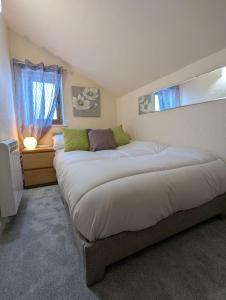 a bedroom with two large beds in it at Cosy Country Styled Apartment in Kidsgrove