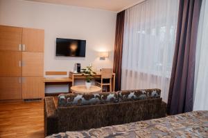 TV a/nebo společenská místnost v ubytování Pärnu Hotel