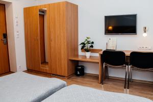 TV a/nebo společenská místnost v ubytování Pärnu Hotel