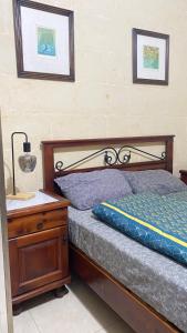 Letto o letti in una camera di Pool and Fun in Gozo, Great place to relax and enjoy nature