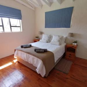 Postel nebo postele na pokoji v ubytování Crafters Cottage + 53 fotografií