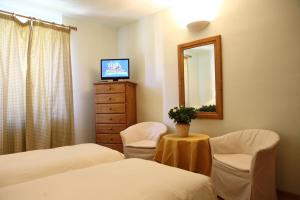 Postel nebo postele na pokoji v ubytování Hotel Residence Valverde