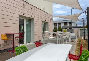 Balkón nebo terasa v ubytování B&B HOTEL CHARTRES Oceane