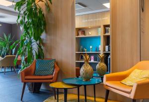 Posezení v ubytování B&B HOTEL CHARTRES Oceane