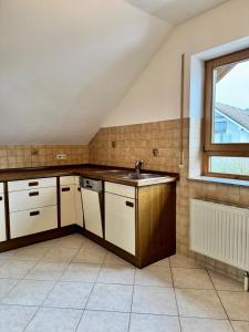 Η κουζίνα ή μικρή κουζίνα στο Großzügiges Apartment mit tollem Ausblick +7 φωτογραφίες