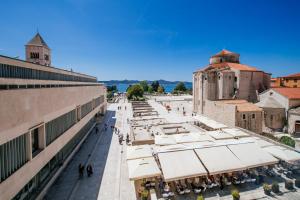 an overhead view of a city street with a building at Boutique Hostel Forum in Zadar