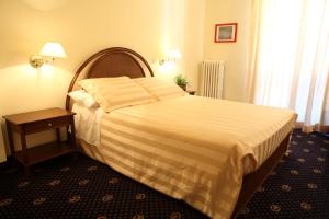 Postel nebo postele na pokoji v ubytování Hotel Residence Valverde