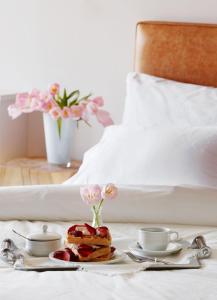 A bed or beds in a room at Armonia Luxury Villa