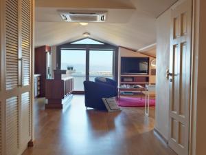 A bed or beds in a room at Armonia Luxury Villa