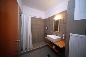 Koupelna v ubytování Hotel Lecadin + 27 fotografií