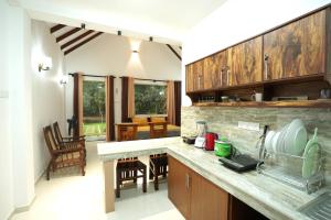 Køkken eller tekøkken på Cozy Stays Villa