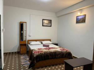 Postel nebo postele na pokoji v ubytování Pradhan Homestay Mirik - Homestay beside Mirik Lake