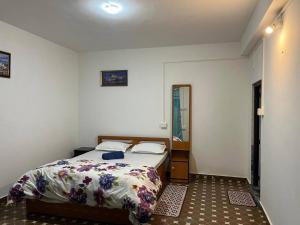 Postel nebo postele na pokoji v ubytování Pradhan Homestay Mirik - Homestay beside Mirik Lake