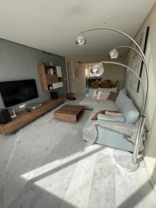 Χώρος καθιστικού στο HL 012 Holiday rentals 3 Bed 2 Bath luxury apartment on HDA golf resort , Fuente Alamo , Murcia