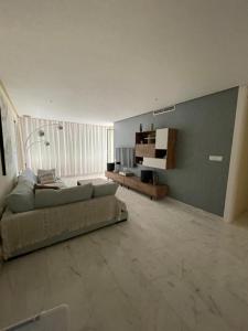 Χώρος καθιστικού στο HL 012 Holiday rentals 3 Bed 2 Bath luxury apartment on HDA golf resort , Fuente Alamo , Murcia