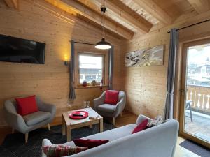 Telewizja i/lub zestaw kina domowego w obiekcie Apartment Jochblick by Interhome