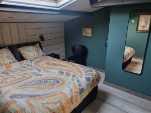 Postel nebo postele na pokoji v ubytování vakantiehuis en appartement De Harscamp