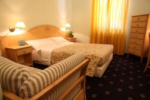 Postel nebo postele na pokoji v ubytování Hotel Residence Valverde