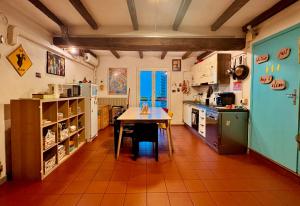 Kuchyň nebo kuchyňský kout v ubytování Hostel Il Nosadillo - Bologna + 37 fotografií