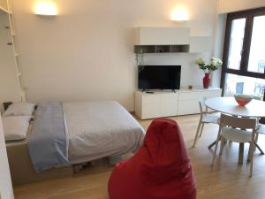 A television and/or entertainment centre at Music House - Carozzi Apartments