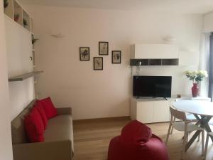 A television and/or entertainment centre at Music House - Carozzi Apartments