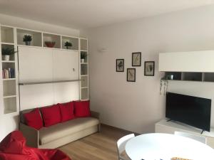 A seating area at Music House - Carozzi Apartments