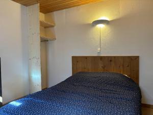 Posteľ alebo postele v izbe v ubytovaní Studio mezzanine avec balcon et parking privé au cœur de Villard-de-Lans - FR-1-548-28
