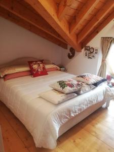Ένα ή περισσότερα κρεβάτια σε δωμάτιο στο Casa gnomi