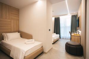 Voodi või voodid majutusasutuse Hotel Flamingo 1 toas