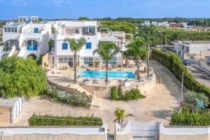 an aerial view of a house with a swimming pool at Villa Solemare by Raro Villas in Nardò