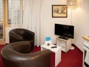 TV/trung tâm giải trí tại Apartment Chalet Abendrot apARTments-4 by Interhome