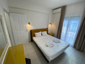 Sunny Beach Potos客房内的一张或多张床位