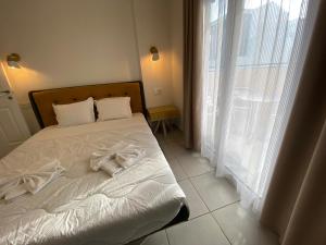 Sunny Beach Potos客房内的一张或多张床位
