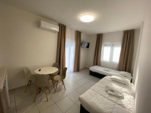 Sunny Beach Potos客房内的一张或多张床位