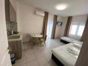 Sunny Beach Potos客房内的一张或多张床位