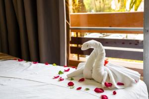 Postel nebo postele na pokoji v ubytování Hotel Le Grand Imilchil